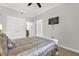 Bedroom with a comfortable bed, TV, and closet, providing ample storage at 7613 Cabana Ct # 102, Reunion, FL 34747