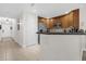 Kitchen with stainless steel appliances, granite countertops, and plenty of cabinet space at 7613 Cabana Ct # 102, Reunion, FL 34747