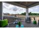Relaxing balcony featuring comfortable seating and scenic views of the surrounding landscape at 842 Creeping Fig St, Apopka, FL 32703