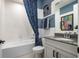 Contemporary bathroom with white subway tile, stylish fixtures, and a clean, modern design at 842 Creeping Fig St, Apopka, FL 32703