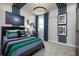 Stylish bedroom with unique decor, a comfortable bed, and ample natural light at 842 Creeping Fig St, Apopka, FL 32703