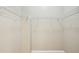 Walk-in closet interior view featuring wire shelving system for organization at 8430 Leatherleaf Ln, Orlando, FL 32827
