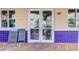Community deli and market store front featuring clean double doors and large menu boards for local residents at 8430 Leatherleaf Ln, Orlando, FL 32827