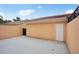 Back of house exterior featuring a patio and doorway for outdoor enjoyment and easy access at 8430 Leatherleaf Ln, Orlando, FL 32827
