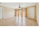 Bright and airy living room featuring tile floors, a ceiling fan, and sliding glass doors to the patio at 8430 Leatherleaf Ln, Orlando, FL 32827