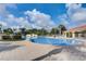 Luxurious community pool area, perfect for relaxation and social gatherings on sunny days at 8430 Leatherleaf Ln, Orlando, FL 32827