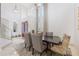 Elegant dining room boasting high ceilings, neutral color palette, and lots of natural light at 9062 Dancy Tree Ct, Orlando, FL 32836