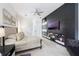 Stylish main bedroom features a modern built-in cabinet and shelving, and a plush bed at 9062 Dancy Tree Ct, Orlando, FL 32836