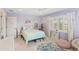 Bright bedroom with a bed, a window, and soft colors, perfect for a room at 9146 Bay Point Dr, Orlando, FL 32819
