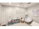 Charming bedroom with neutral walls, playful decor, and comfortable furnishings at 9146 Bay Point Dr, Orlando, FL 32819