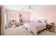 Pink bedroom with bed, window, and toys, perfect for a room at 9146 Bay Point Dr, Orlando, FL 32819