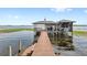 Dock and boat house on a beautiful lake at 9146 Bay Point Dr, Orlando, FL 32819