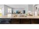 Kitchen with view of sink, stainless steel faucet, laminate counter and view into the living room at 984 Chanler Dr, Haines City, FL 33844
