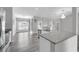 Modern kitchen featuring stainless steel appliances, gray countertops, and an island with a sink at 3956 Shadowind Way, Gotha, FL 34734