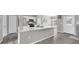 Bright kitchen with stainless steel appliances, a kitchen island, and modern finishes at 3956 Shadowind Way, Gotha, FL 34734