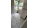 Compact kitchen features white linoleum flooring, and a white refrigerator at 1030 Nw 13Th Ave, Ocala, FL 34475