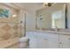 Elegant bathroom features a walk-in shower, marble vanity, and sleek fixtures at 11103 Bridge House Rd, Windermere, FL 34786