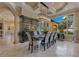 Elegant dining area with wine storage and scenic views at 11103 Bridge House Rd, Windermere, FL 34786