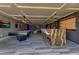 Spacious game room with a pool table, bar, and stylish lighting at 11103 Bridge House Rd, Windermere, FL 34786