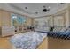 Sunlit loft with French doors opening to a balcony, offering spacious living at 11103 Bridge House Rd, Windermere, FL 34786
