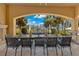 Expansive outdoor dining area offering scenic water views, perfect for al fresco meals and gatherings at 11103 Bridge House Rd, Windermere, FL 34786