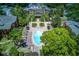 Aerial view of an apartment community featuring a pool and landscaping at 114 Vista Verdi Cir # 116, Lake Mary, FL 32746