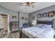 Bedroom featuring wood-look floors and accent art at 114 Vista Verdi Cir # 116, Lake Mary, FL 32746