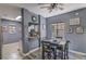 Cozy dining area with modern ceiling fan and a view of the kitchen at 114 Vista Verdi Cir # 116, Lake Mary, FL 32746