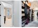 Walk-in closet with custom shelving and storage at 1154 Kerwood Cir, Oviedo, FL 32765