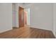 This bedroom features wood-look floors, neutral walls and a closet at 1170 E Bay St, Winter Garden, FL 34787