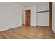 This bedroom features wood-look floors, neutral walls and a closet at 1170 E Bay St, Winter Garden, FL 34787