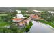 Aerial view of the community with picturesque waterfront and golf course views at 118 Ventana Dr, Kissimmee, FL 34759