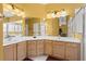 Primary bathroom with double sinks, tile flooring, and a vanity with plenty of storage at 118 Ventana Dr, Kissimmee, FL 34759