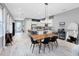Open concept dining and kitchen area with lots of natural light and modern accents at 13334 Beebe Aly, Orlando, FL 32827