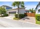 Contemporary home with a two-car garage, well-kept landscaping, and a modern fence at 13334 Beebe Aly, Orlando, FL 32827