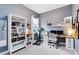 Bright office space featuring a built-in desk, shelving, and a window for natural light at 13334 Beebe Aly, Orlando, FL 32827