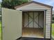 View of the exterior of the metal shed at 1335 Cr 442, Lake Panasoffkee, FL 33538