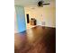 Spacious living room with dark wood flooring and natural light at 1335 Cr 442, Lake Panasoffkee, FL 33538