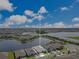 Aerial perspective of a home in a lakeside community, with a pool and well-maintained landscaping at 13461 Panama Beach Ct, Orlando, FL 32827