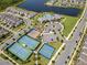 Aerial view showcasing tennis and basketball courts along with surrounding homes and community areas by the lake at 13461 Panama Beach Ct, Orlando, FL 32827