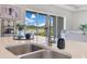 Modern kitchen sink featuring a view of a scenic lake at 13461 Panama Beach Ct, Orlando, FL 32827