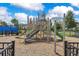 Community playground with slides and climbing structures for outdoor fun at 13461 Panama Beach Ct, Orlando, FL 32827