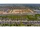 Aerial view shows the community, ongoing construction, and highway access at 144 Williamson Dr, Davenport, FL 33897