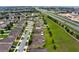 Expansive aerial view showcases the community, highlighting the well-maintained homes and convenient access to the highway at 144 Williamson Dr, Davenport, FL 33897