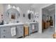 Bathroom with dual vanities, ample storage, and modern fixtures providing both style and function at 14423 Tambourine Dr, Orlando, FL 32837