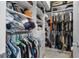 Walk-in closet showcasing organized shelving and hanging space, maximizing storage and accessibility at 14423 Tambourine Dr, Orlando, FL 32837