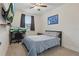 Bedroom with a bed, workstation, and a neutral color palette offering a relaxing retreat at 1462 Brookdale Ct, Oviedo, FL 32765