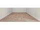 Empty bedroom showcasing neutral carpet and base trim, ready for personalization at 1462 Brookdale Ct, Oviedo, FL 32765