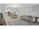Open-concept living and dining area with a seamless flow to the modern kitchen at 1462 Brookdale Ct, Oviedo, FL 32765