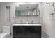Contemporary bathroom featuring a double sink vanity with a large mirror and modern fixtures at 1519 N Westmoreland Dr, Orlando, FL 32804